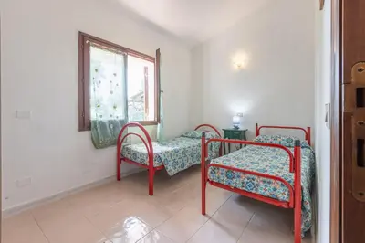 Letto o letti in una camera di GuestHost - Cri's Home