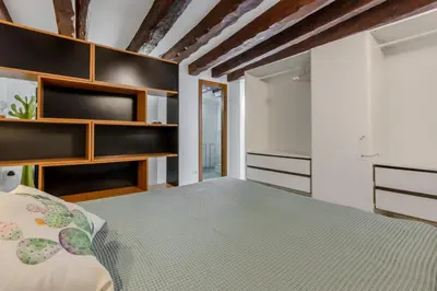 Letto o letti in una camera di GuestHost - Comfy Studio in the Heart of Cagliari