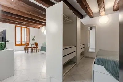 Area soggiorno di GuestHost - Comfy Studio in the Heart of Cagliari