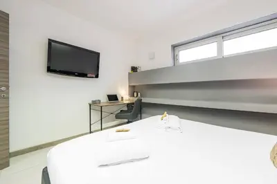 Letto o letti in una camera di Urban 7 by Propertize