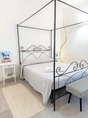 Letto o letti in una camera di Appartamento a Pula