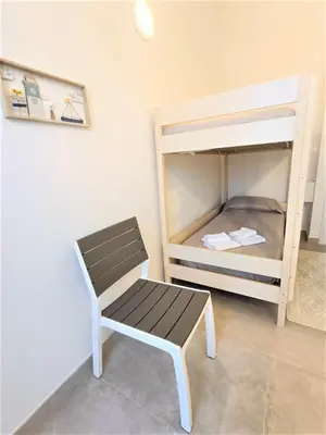 Letto o letti in una camera di Appartamento a Pula