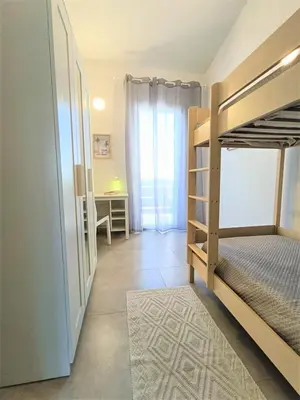 Letto o letti in una camera di Appartamento a Pula