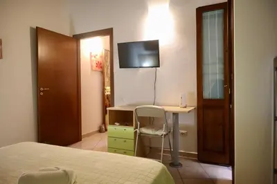 Letto o letti in una camera di Maestrale di Sardegna