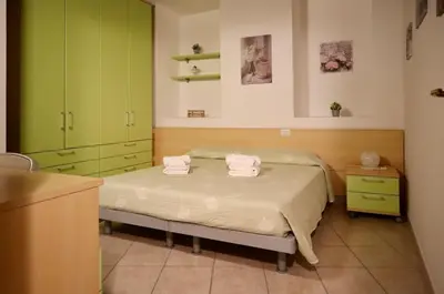 Letto o letti in una camera di Maestrale di Sardegna