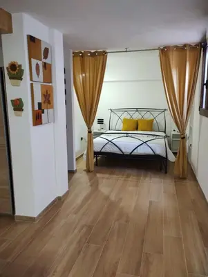 Letto o letti in una camera di Casa vacanza SOLE E LUNA