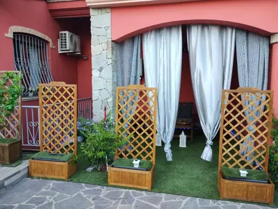Giardino di Casa vacanza SOLE E LUNA