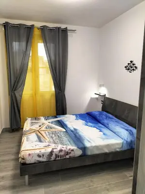 Letto o letti in una camera di GiadaHome