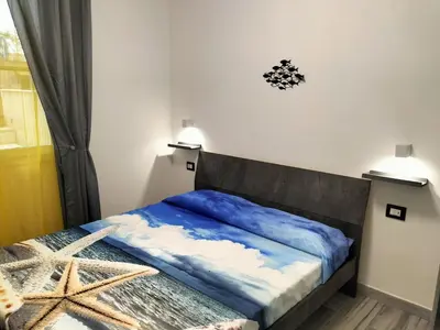 Letto o letti in una camera di GiadaHome