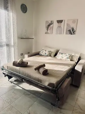 Letto o letti in una camera di Cagliari AirPort Apartment