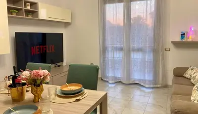 Area soggiorno di Cagliari AirPort Apartment