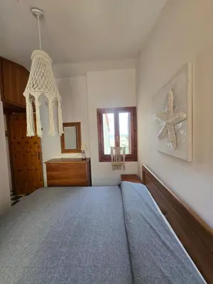 Letto o letti in una camera di Golden Dune View