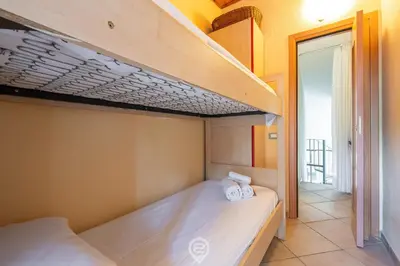 Letto o letti in una camera di Villa Mary
