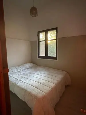 Letto o letti in una camera di Villa Santa Margherita di Pula