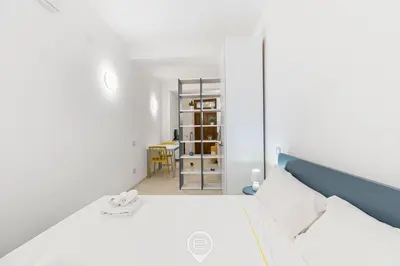 Letto o letti in una camera di New St John Apt