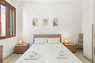 Letto o letti in una camera di Domus Sant'Eusebio
