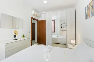 Letto o letti in una camera di Domus Karalitana