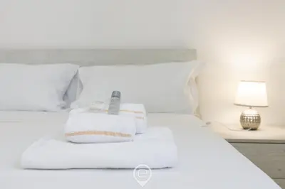 Letto o letti in una camera di Domus Karalitana