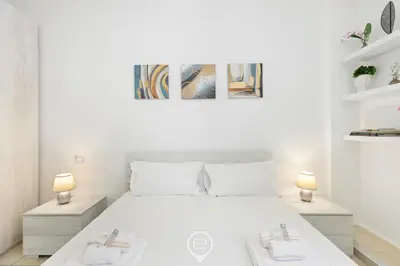 Letto o letti in una camera di Domus Karalitana