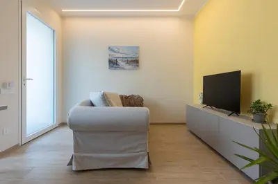 TV o dispositivi per l'intrattenimento presso Domus Mameli Apartment B