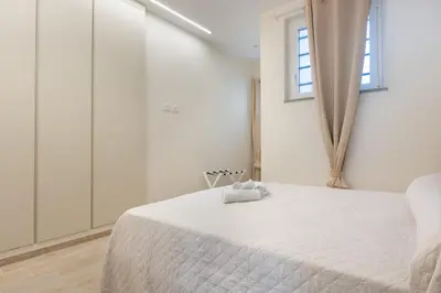 Letto o letti in una camera di Domus Mameli Apartment B