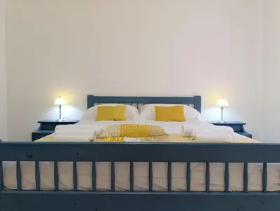 Letto o letti in una camera di Vizhouse
