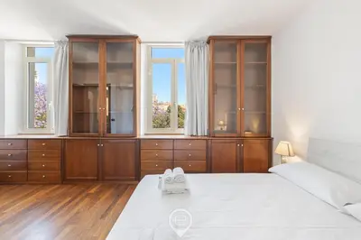 Letto o letti in una camera di The San Cosimo Loft