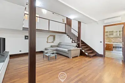 Area soggiorno di The San Cosimo Loft