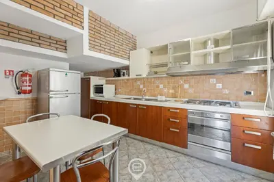 Cucina o angolo cottura di The San Cosimo Loft
