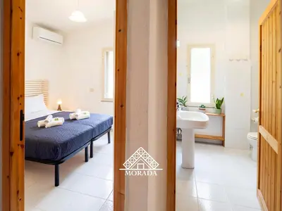 Letto o letti in una camera di Villa Arrubia - Morada
