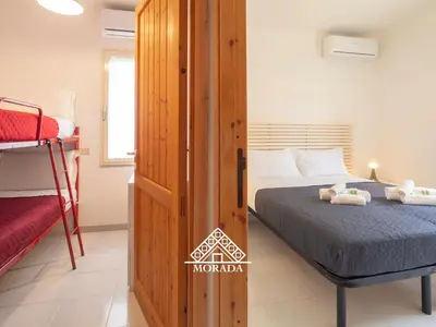 Letto o letti in una camera di Villa Arrubia - Morada