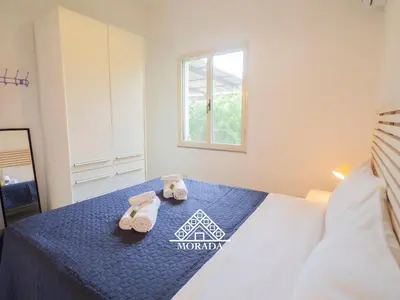 Letto o letti in una camera di Villa Arrubia - Morada