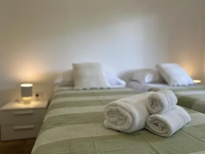 Letto o letti in una camera di 16 - Villa IsolaBella - Sa Crai Apartments Sardinian Experience