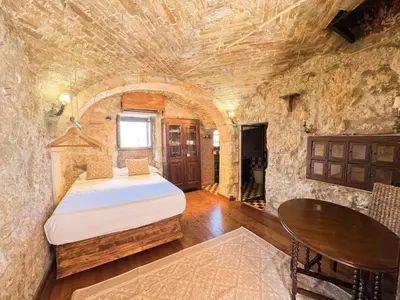 Letto o letti in una camera di Kalma Elephant Tower - Medieval Stay with a City View