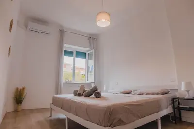 Letto o letti in una camera di Sunny apartment