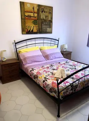 Letto o letti in una camera di Apartment in Santa Maria Navarrese Casa Concannas