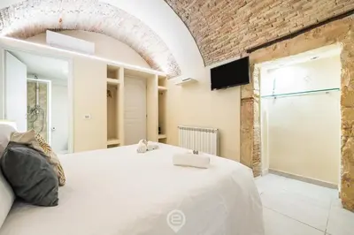 Letto o letti in una camera di Amo Castle Rooms