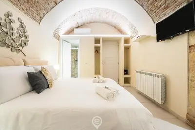 Letto o letti in una camera di Amo Castle Rooms