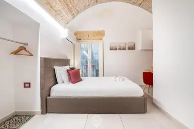 Letto o letti in una camera di Amo Castle Rooms