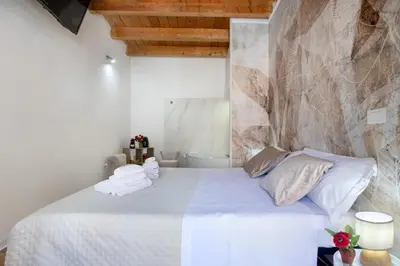Letto o letti in una camera di Alma Little House
