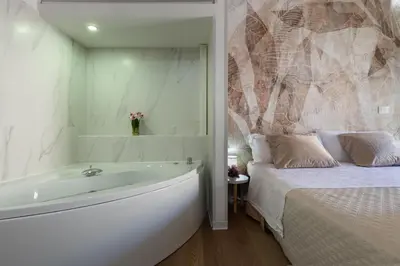 Letto o letti in una camera di Alma Little House