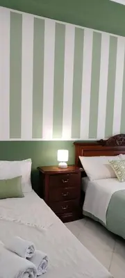 Letto o letti in una camera di A casa di nonna bis