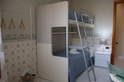 Letto o letti in una camera di A casa di nonna bis