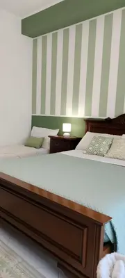 Letto o letti in una camera di A casa di nonna bis