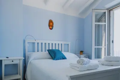 Letto o letti in una camera di Vento d'Estate B&B
