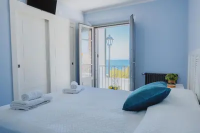 Letto o letti in una camera di Vento d'Estate B&B
