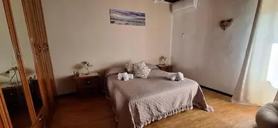 Letto o letti in una camera di La Rondine