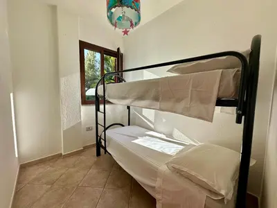 Letto o letti in una camera di Palm house - seaside vacation home!