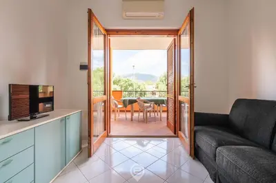 Area soggiorno di Casa Guia - Central Villasimius Stay