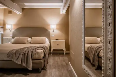 Letto o letti in una camera di Palazzo Dessy Historic House